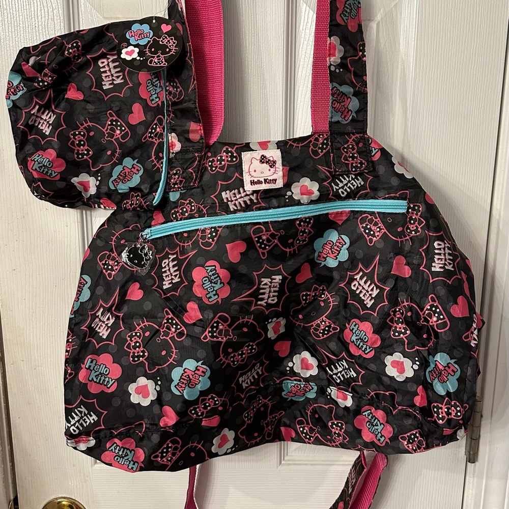 2011 Sanrio Hello Kitty nylon bag with expanding strap and storage pouch NWT